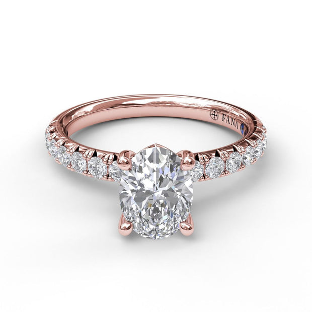 Oval Cut Solitaire With French Cut Pave