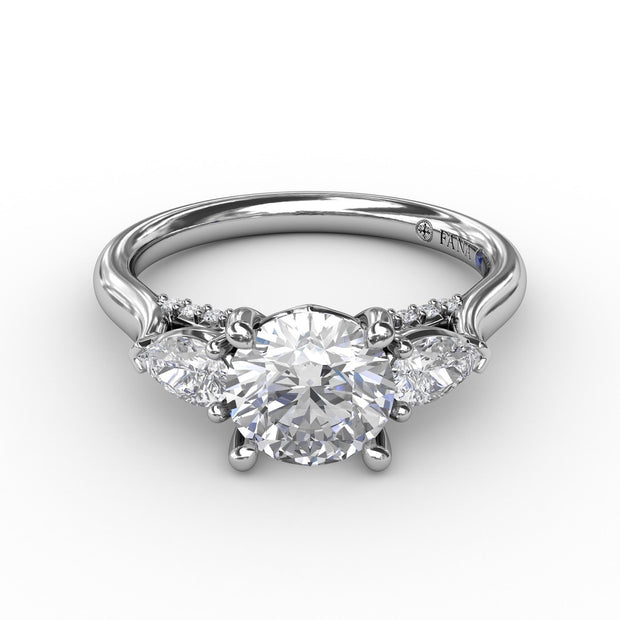 Classic Three-Stone Diamond Engagement Ring With Pear-Shape Side Diamonds