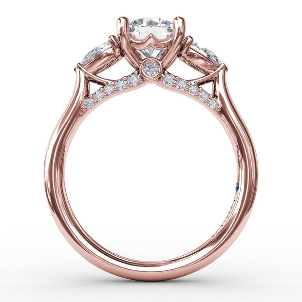 Classic Three-Stone Diamond Engagement Ring With Pear-Shape Side Diamonds
