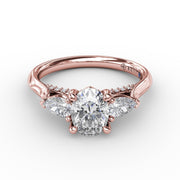 Classic Oval Three-Stone Diamond Engagement Ring With Pear-Shape Side Diamonds