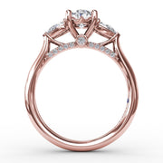 Classic Oval Three-Stone Diamond Engagement Ring With Pear-Shape Side Diamonds