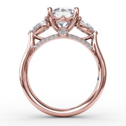 Classic Three-Stone Engagement Ring With Pear-Shape Side Diamonds