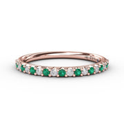 Delicate Emerald Shared Prong Anniversary Band