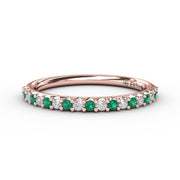 Delicate Emerald Shared Prong Anniversary Band