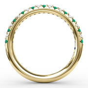 Delicate Emerald Shared Prong Anniversary Band