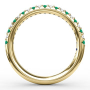 Delicate Emerald Shared Prong Anniversary Band